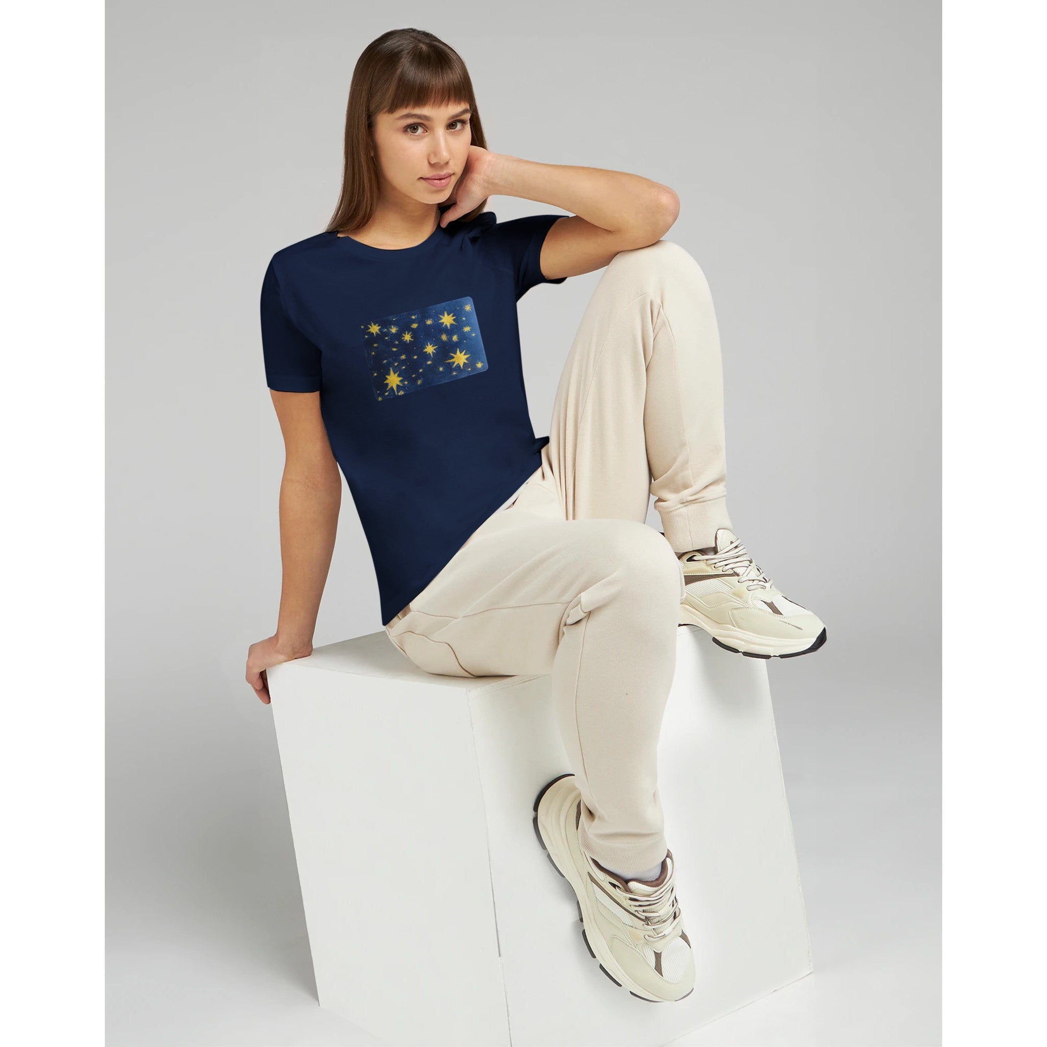 Relaxed fit women's t-shirt white printed handpainted artwork lifestyle shot
