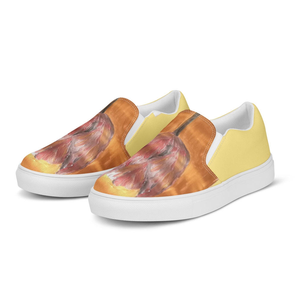Women's slip-on canvas shoes in white with printed handpainted artwork - left front angle
